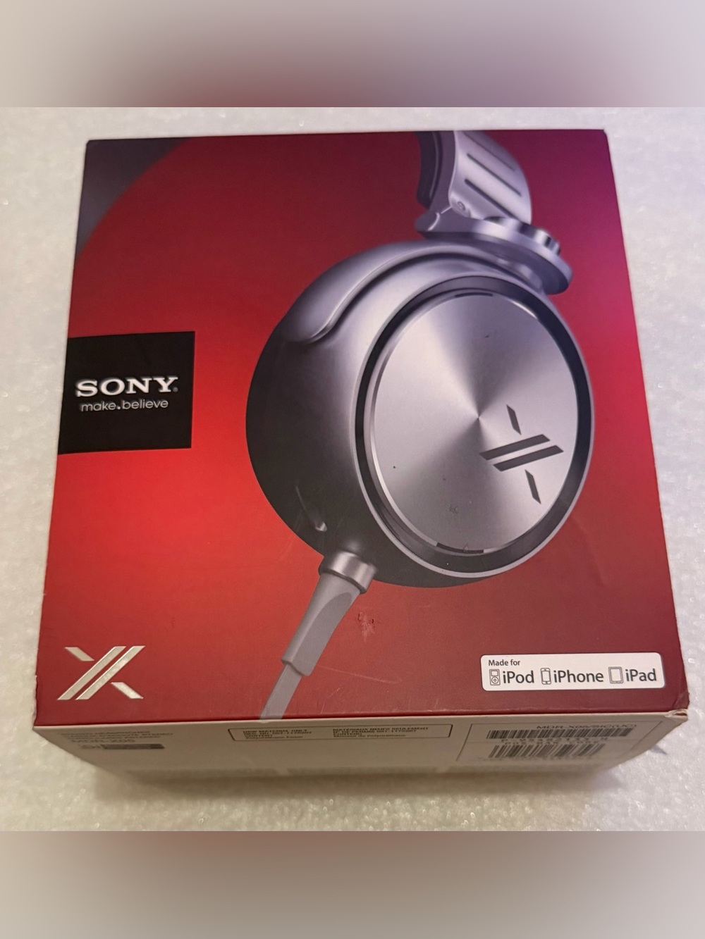 Sony Red Packaging with Silver Logo - MDR-X05 Box